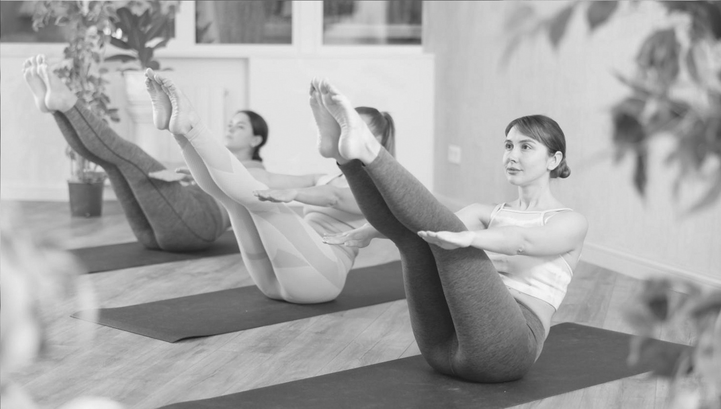 Client practising yoga at home during an online session